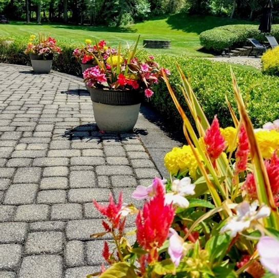 Cleveland Area Landscaping Flower Planters on Brick Patio