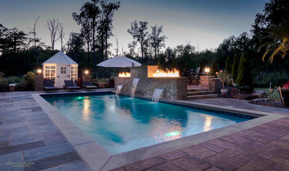 Cleveland Landscaping Company Project Patio and Pool with Waterfall and Fire Wall Feature