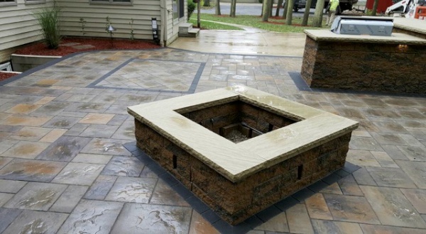 H&M Landscaping Installs Beautiful Stamped Concrete Patio and Fire Pit near Cleveland