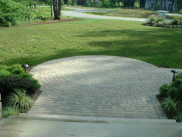H&M Landscaping circular paver patio and walk located in Bainbridge - Geauga County Ohio