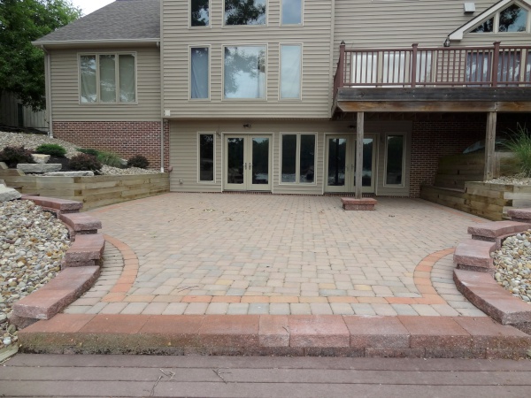H&M Landscaping paver patio with wooden and paver retaining walls located in Claridon - Geauga County Ohio