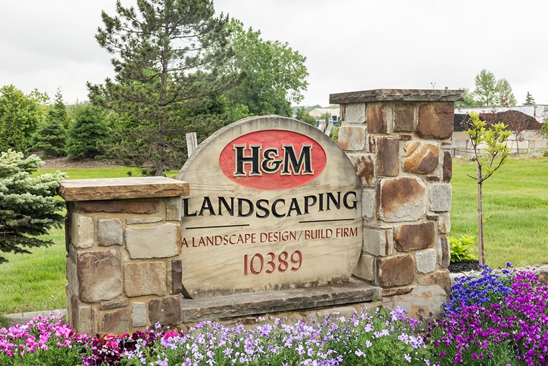 Stone monument sign for H&M Landscaping in Newbury, Ohio